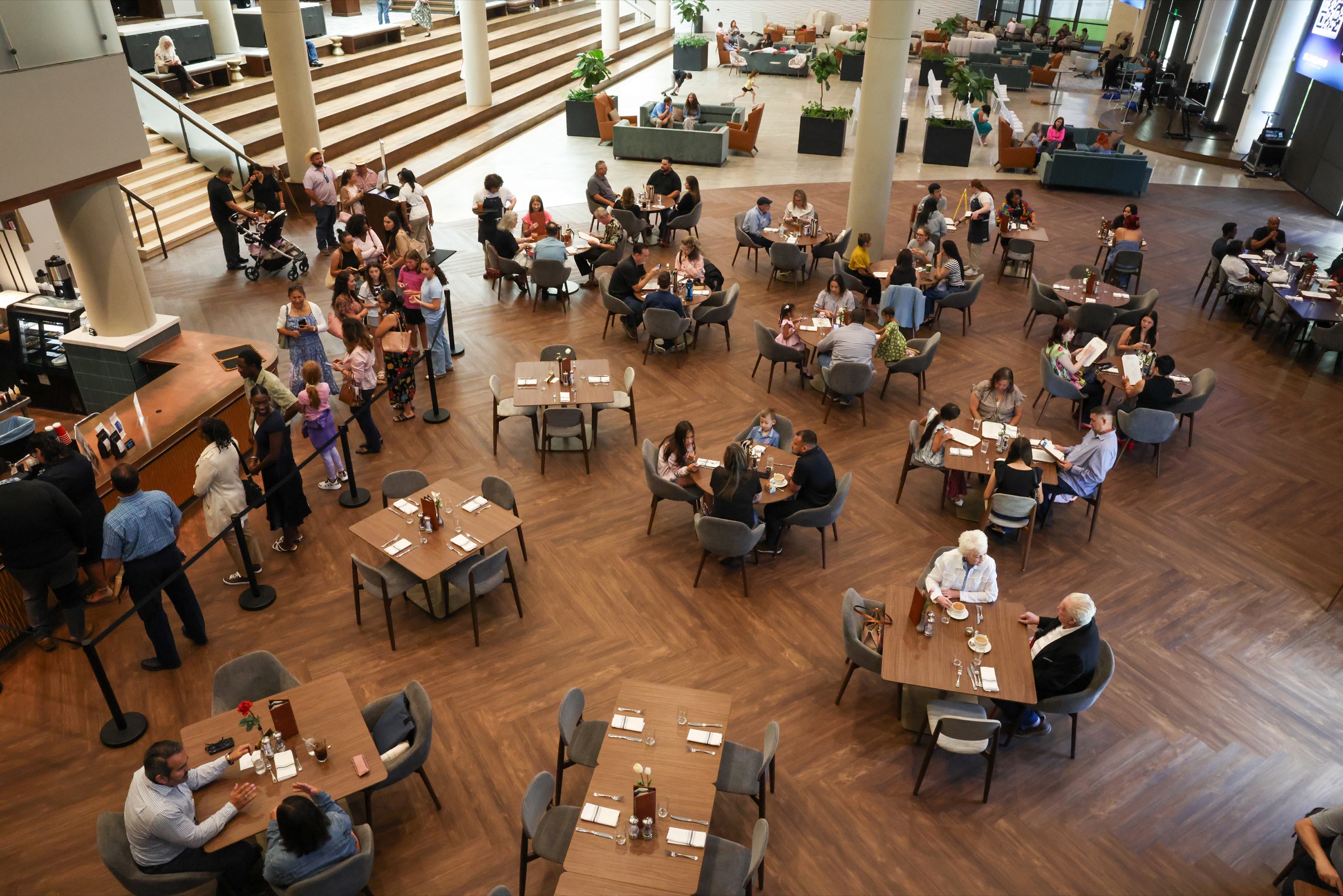 Guests gathered at Solid Rock Café, the dining room full of tables, conversation and light